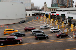 Vehicles enter the United States as a minivan drives to Canada in the Detroit-Windsor Tunnel in Detroit on Monday, March 16.