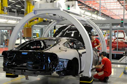 A technician works at the Ferrari department factory in Maranello, Italy.