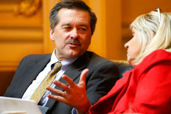 Del. Terry Kilgore R-Scott, left, talks with Del. Kathy Byron, R-Bedford, during the House session at the Capitol Friday, Feb. 28, 2020, in Richmond, Va. Legislators from southwest Virginia have mounted a huge push to oppose the possible early closure of one of the country's newest coal plants.