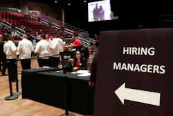 In this Tuesday, June 4, 2019, file photo, managers wait for job applicants at the Seminole Hard Rock Hotel & Casino Hollywood during a job fair in Hollywood, Fla. U.S. businesses added 183,000 jobs in Jan. 2020, a solid gain that shows the economy was largely healthy when the coronavirus outbreak spread further around the globe. Large companies added roughly two-thirds of the jobs, while hiring among smaller firms was relatively weak. Manufacturing and mining firms shed jobs, while hiring in health care and hotels and restaurants was strong.