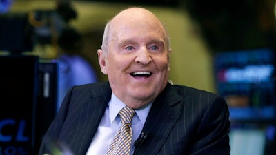In this Oct. 22, 2013 file photo, former Chairman and CEO of General Electric Jack Welch appears on CNBC on the floor of the New York Stock Exchange. Welch, who transformed General Electric Co. into a highly profitable multinational conglomerate and parlayed his legendary business acumen into a retirement career as a corporate leadership guru, has died at the age of 84.