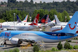 This Aug. 15, 2019, file photo shows dozens of grounded Boeing 737 Max airplanes crowd a parking area adjacent to Boeing Field in Seattle. A congressional committee says a “culture of concealment” at Boeing and poor oversight by federal regulators contributed to two deadly crashes involving the 737 Max jetliner. The House Transportation Committee issued a summary Friday, March 6, 2020, of its investigation so far into Boeing and the Federal Aviation Administration.