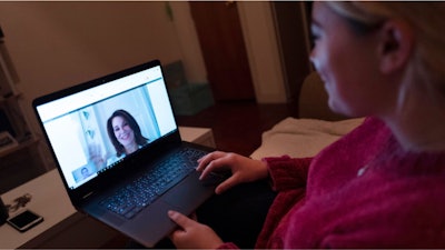 A patient during a telemedicine video conference with Dr. Deborah Mulligan in Brooklyn.