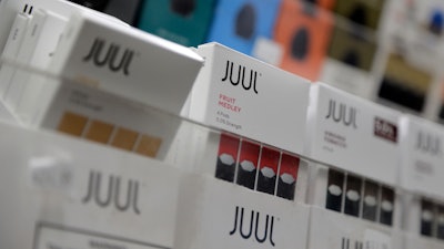 In this Dec. 20, 2018, file photo Juul products are displayed at a smoke shop in New York.