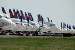 Several dozen mothballed Delta Air Lines jets are parked at Kansas City International Airport in Kansas City, Mo.