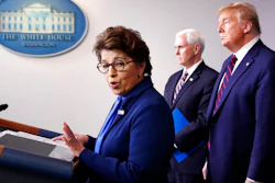 In this Thursday, April 2, 2020 file photo, Jovita Carranza, administrator of the Small Business Administration, speaks about the coronavirus in the James Brady Press Briefing Room of the White House n Washington, as Vice President Mike Pence, President Donald Trump listen. Millions of small businesses are expected to apply for a desperately needed rescue loan Friday, a stern test for a banking industry that has had less than a week to prepare for the deluge. Small businesses will be seeking loans from the $349 billion Paycheck Protection Program, which was put in place to help them retain workers and pay bills during the coronavirus pandemic.