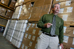 In this April 29, 2009, file photo, Don Wood, an official with the Strategic National Stockpile, awaits another truck load of medications in Salt Lake City, Utah during a swine flu outbreak from the H1N1 virus. The 2009 H1N1 pandemic prompted the largest use to date of the stockpile, which was created in 1999. It has never confronted anything on the scale of the current COVID-19 pandemic.
