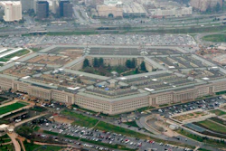 This March 27, 2008, aerial file photo, shows the Pentagon in Washington. The Pentagon is reconsidering its awarding of a major cloud computing contract to Microsoft after rival tech giant Amazon protested what it called a flawed bidding process. U.S. government lawyers said in a court filing this week of March 13, 2020 that the Defense Department “wishes to reconsider its award decision” and take another look at how it evaluated technical aspects of the companies' proposals to run the $10 billion computing project. (AP Photo/Charles Dharapak, File)