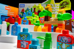 Mega Bloks, by Mattel, are displayed at Toy Fair New York, in the Javits Convention Center, Monday, Feb. 24, 2020. From Baby Yoda to eco-friendly stacking rings, toymakers displayed an array of goods that they hope will be on kids' wish lists for the holiday 2020 season. The four-day Toy Fair comes as the U.S. toy industry has been whipsawed by a number of obstacles.