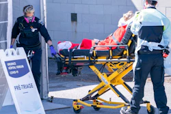 A patient is wheeled into the emergency unit of the Verdun Hospital in Montreal on Monday, April 6, 2020. Prime Minister Justin Trudeau says he’s confident Canada will still be able to import N95 protective masks form the U.S. despite an export ban and says he will talk to U.S. President Donald Trump in the coming days.