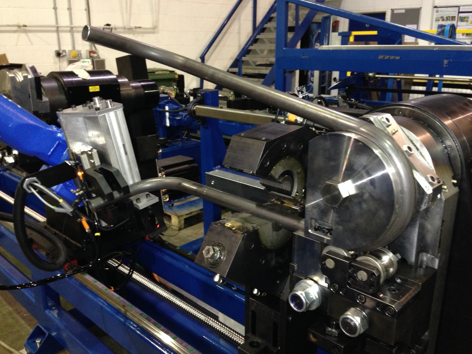 The cell developed by Ingenium Integration for automated wheelbarrow frame production undergoing trials.