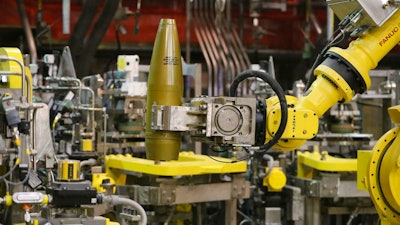 In this Jan. 29, 2015, file photo, a remotely controlled robot handles an inert simulated chemical munition during training at the Pueblo Chemical Depot in southern Colorado. The Army announced Wednesday, June 13, 2018, the depot had resumed destroying decades-old shells containing liquid mustard agent this week. The plant had been shut down for repairs since September.
