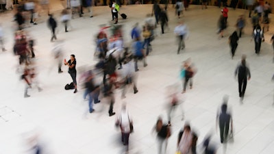 In this June 15, 2017, photo, people walk inside the Oculus, the new transit station at the World Trade Center in New York. Data collection practices of tech firms are increasingly under the microscope. An Associated Press investigation shows that using Google services on Android devices and iPhones allows the search giant to record your whereabouts as you go about your day.