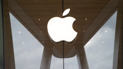 In this Jan. 3, 2019 file photo, the Apple logo is displayed at the Apple store in the Brooklyn borough of New York. Apple has made the group chat function in FaceTime unavailable, Tuesday Jan. 29, 2019, after users said there was a bug that could allow callers to activate another user's microphone remotely.