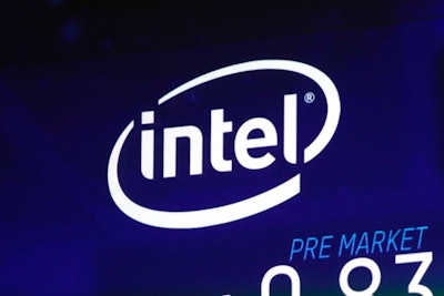 In this Oct. 3, 2018, file photo the Intel logo appears on a screen at the Nasdaq MarketSite, in New York's Times Square. Apple is paying Intel $1 billion for the chip maker's smartphone modem division in a deal driven by the upcoming transition to the next generation of wireless technology.