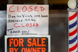 In this April 2, 2020 file photo, 'For Sale By Owner' and 'Closed Due to Virus' signs are displayed in the window of a store in Grosse Pointe Woods, Mich. Business filings under Chapter 11 of the federal bankruptcy law rose sharply in March, and attorneys who work with struggling companies are seeing signs that more owners are contemplating the possibility of bankruptcy. Government aid my simply be too little too late.