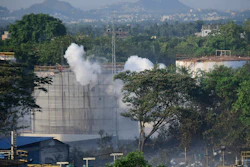 Smoke rises from LG Polymers plant, the site of a chemical gas leakage, in Vishakhapatnam, India.