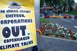 Demonstrators block the main entrance of Chevron Corp. in San Ramon, Calif.