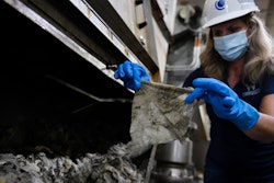 WSSC Water spokesperson holds up a wipe that was collected along with other debris at a pumping station.