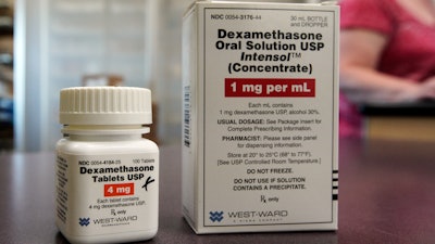 Packages of Dexamethasone are displayed in a pharmacy, Tuesday, June 16, 2020, in Omaha, Neb. Researchers in England said Tuesday they have the first evidence that the drug can improve COVID-19 survival. The cheap, widely available steroid called dexamethasone reduced deaths by up to one third in severely ill hospitalized patients.