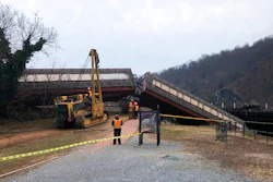 This Dec. 21, 2019 file photo photo provided by the Washington County, Md., shows a freight line train in the Potomac River near Harpers Ferry, W.Va. A report from the Federal Railroad Administration says an engineer error caused a CSX freight train to derail as it crossed the Potomac River near Harpers Ferry, West Virginia. The derailment in December sent two cars into the water and damaged a footbridge that is part of the Appalachian Trail