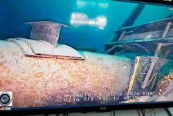 Shot from a television screen shows damage to anchor support.