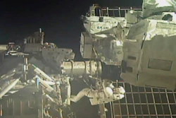 In this image taken from video, commander Chris Cassidy, right, and astronaut Bob Behnken perform a spacewalk, July 1, 2020.