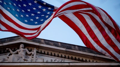 American flag flies outside the Department of Justice in Washington.