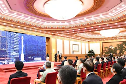 In this photo released by Xinhua News Agency, officials attend the completion and commissioning ceremony for the Beidou Navigation Satellite System (BDS-3) at the Great Hall of the People in Beijing Friday, July 31, 2020. China is celebrating the completion of its BeiDou Navigation Satellite System that could rival the U.S. Global Positioning System and significantly boost China's security and geopolitical clout.