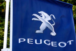 In this file photo dated Wednesday, Dec.18, 2019, the logo of French car maker Peugeot is pictured in Paris. The maker of Peugeot and Citroen cars, PSA Group, said Tuesday July 28, 2020, that it made a profit in the first six months of the year even as the coronavirus pandemic caused a deep drop in sales.