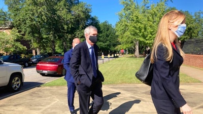 Former SCANA Corp. Senior Vice President Stephen Byrne enters the Matthew J. Perry, Jr. Courthouse in Columbia, S.C. to enter a guilty plea to one count of conspiracy to commit mail and wire fraud Thursday, July 23, 2020. Byrne agreed to cooperate with prosecutors in a federal investigation into the failed V.C. Summer nuclear project in South Carolina.