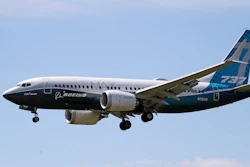 A Boeing 737 MAX jet heads to a landing