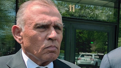 Ariel Quiros outside the federal courthouse in Burlington, Vt., May 22, 2019.