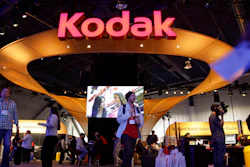 Buyers and industry affiliates pass by the Kodak exhibit at the 2012 International CES trade show in Las Vegas.