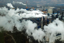 Smoke and steam rise from a coal processing plant in Hejin in central China's Shanxi Province.
