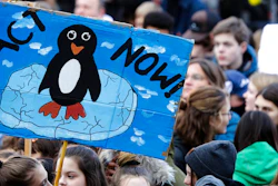 In this Nov. 29, 2019, file photo, young people attend a protest of the Fridays For Future movement in Berlin, Germany. Ten cities around the world on Tuesday, Sept. 22, 2020, joined New York and London in committing to divest from fossil fuel companies as part of efforts to combat climate change. Berlin, Cape Town, Los Angeles, New Orleans, Oslo and others pledged to take “all possible steps to divest city assets from fossil fuel companies and (increase) financial investments in climate solutions.”