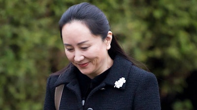 Meng Wanzhou, chief financial officer of Huawei, leaves her home in Vancouver.