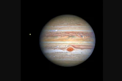 An Aug. 25, 2020, image captured by NASA's Hubble Space Telescope shows Jupiter and one of its moons, Europa, at left.