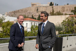 Microsoft President Brad Smith, left, speaks with Greek Prime Minister Kyriakos Mitsotakis during a ceremony in the Acropolis Museum, Athens, Oct. 5, 2020.