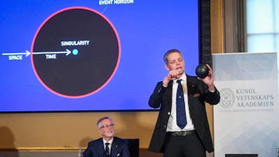 Ulf Danielsson of the Royal Swedish Academy of Sciences during a news conference, Stockholm, Oct. 6, 2020.