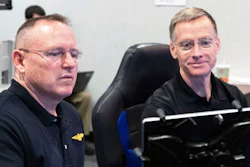 Butch Wilmore, left, and Chris Ferguson participate in a flight control simulation for a Boeing CST-100 Starliner capsule at the Johnson Space Center in Houston, Nov. 29, 2018.