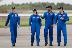 Astronaut Soichi Noguchi, of Japan, from left, NASA Astronauts Shannon Walker, Victor Glover and Michael Hopkins walk after arriving at Kennedy Space Center, Sunday, Nov. 8, 2020, in Cape Canaveral, Fla.