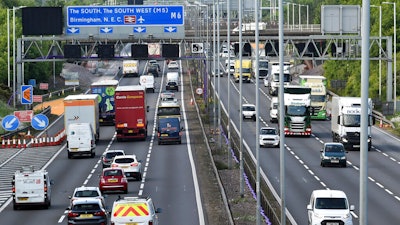 Traffic moves along the M6 motorway near Birmingham, England, May 18, 2020.