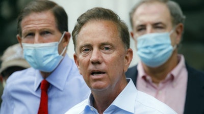 Connecticut Gov. Ned Lamont addresses the media in Westport, Aug. 7, 2020.