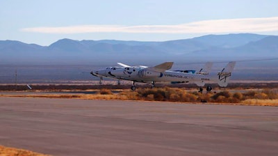 Virgin Galactic's SpaceShipTwo Unity, attached to mothership.