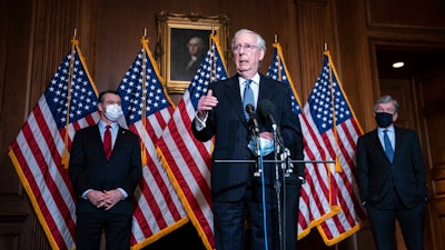 Senate Majority Leader Mitch McConnell of Kentucky, speaks during a news conference following a weekly meeting with the Senate Republican caucus, Tuesday, Dec. 8. 2020 at the Capitol in Washington.