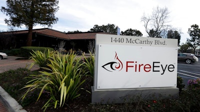 This Wednesday, Feb. 11, 2015 file photo shows FireEye offices in Milpitas, Calif. Experts say it’s going to take months to kick elite hackers widely believed to be Russian out of U.S. government networks. The hackers have been quietly rifling through those networks for months in Washington’s worst cyberespionage failure on record. FireEye is the cybersecurity company that discovered the worst-ever intrusion into U.S. agencies and was among the victims. It has already tallied dozens of casualties. It’s racing to identify more.