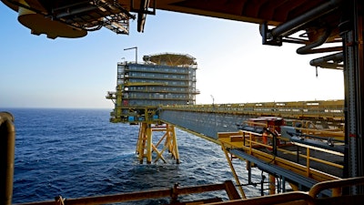 In this Oct. 23, 2013, file photo of A.P. Moller-Maersk's oil rig in the North Sea named Halfdan. Denmark has decided to end to all oil and gas offshore activities in the North Sea by 2050 and has cancelled its latest licensing round, saying the country is 'now putting an end to the fossil era.” The Danish Parliament voted late Thursday to end the offshore gas and oil extraction that started in 1972 and has made it the largest producer in the European Union.