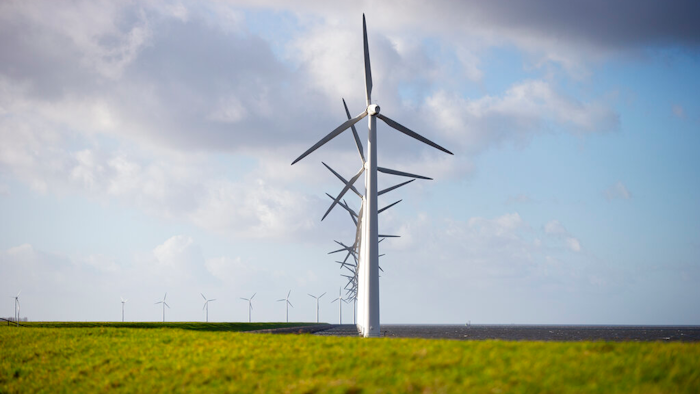 Wind turbines on a dike near Urk, Netherlands, Jan. 22, 2021.