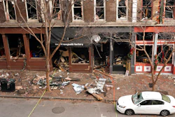 Debris in front of buildings damaged in a Christmas Day explosion in Nashville, Tenn., Dec. 29, 2020.